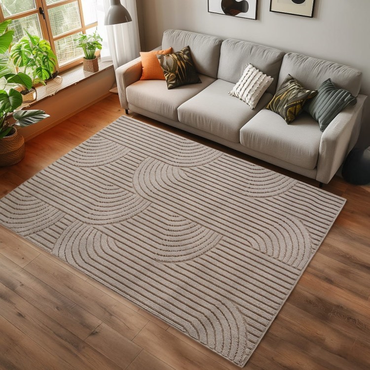 dywan-nowoczesny-3d-helix-jednobarwny-bezowy-geometria-aranzacja-w-salonie-na-ciemnej-podlodze-z-jasna-sofa.jpg