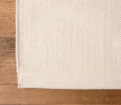 Dywan-Zaran-kośc słoniowa-100%-bawełna-pure-cotton-ręcznie-tkany-zbliżenie-róg-dywanu.jpg