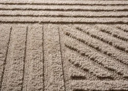 Scandinavisch-vloerkleed-arc-edge-beige-close-up-materiaal.webp